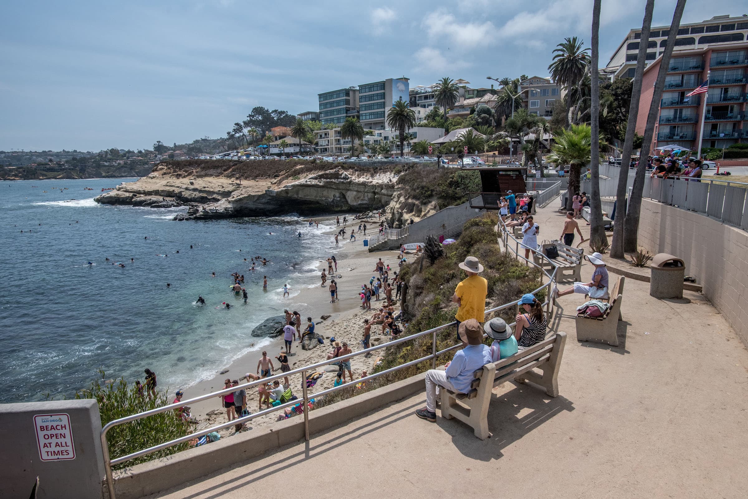 Neighbors walking along a coastal path in La Jolla